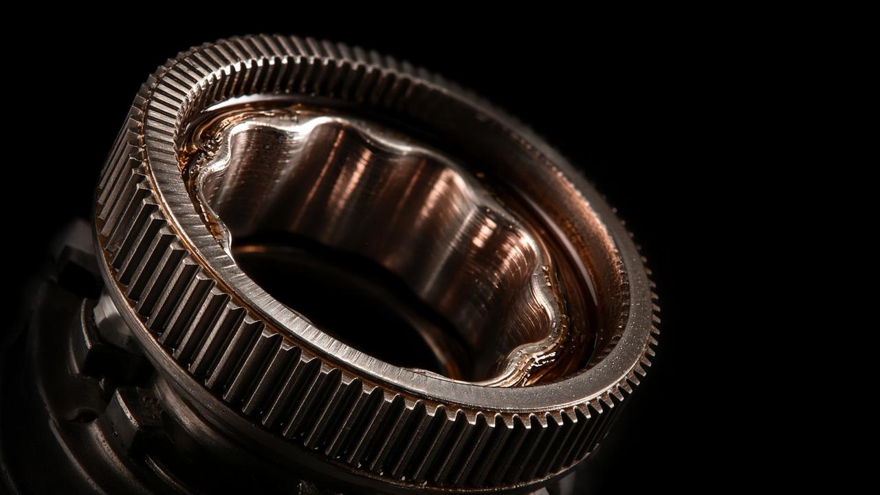 Precision harmonic strain-wave reducer, night studio close-up